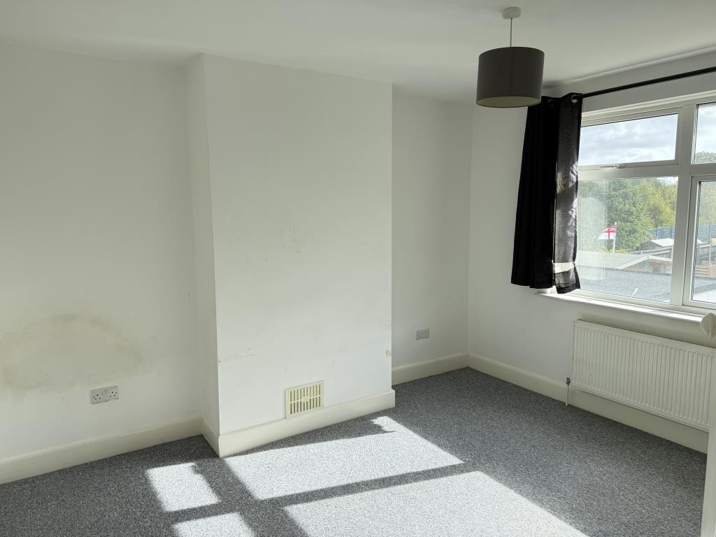 Lot: 124 - THREE-BEDROOM SEMI-DETACHED HOUSE - Bedroom two with white walls and grey carpet